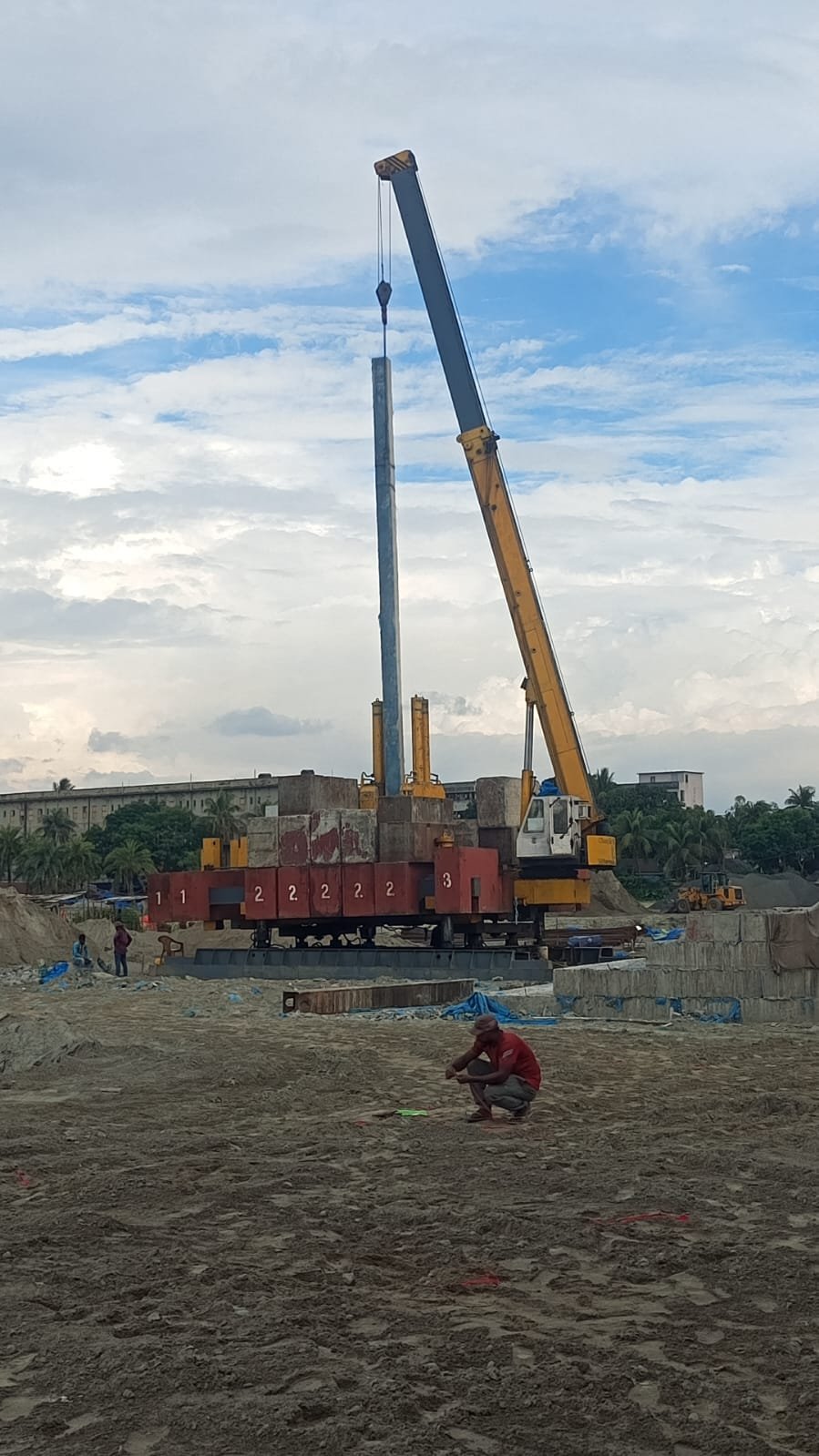 Pre-cast pile making and driving using hydraulic static pile driver by AE Construction Ltd for strong, vibration-free foundations.